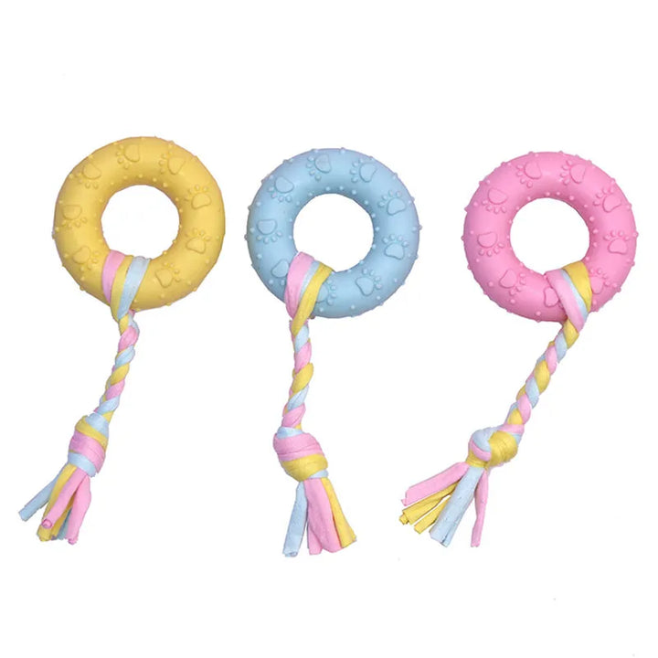 Pets-Shop. Three colorful rubber chew toys for dogs with paw print patterns and ropes attached. Shopets-Amazon.