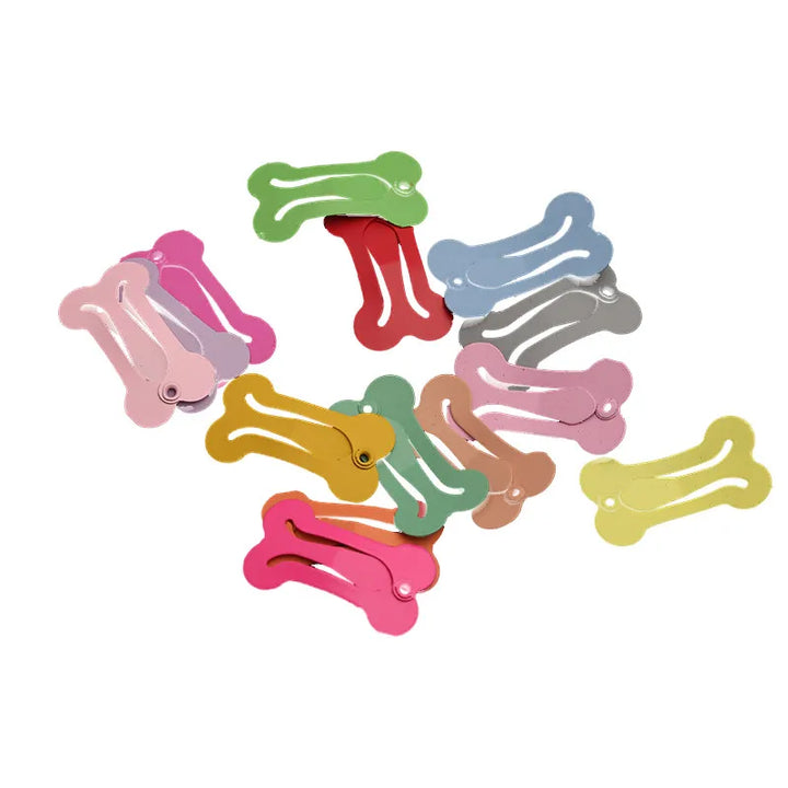 Pets-Shop. Colorful assortment of bone-shaped dog tags on a white background. Shopets-Amazon.