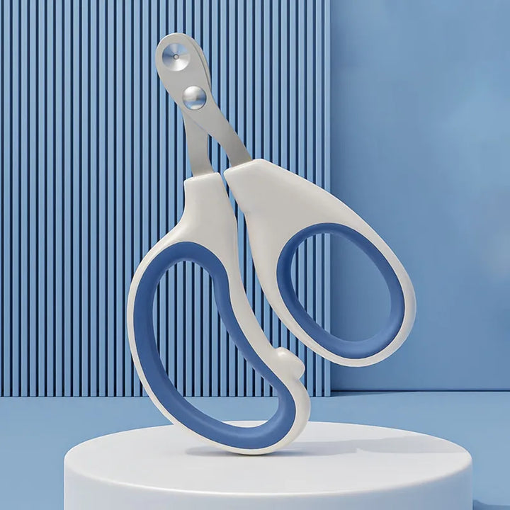 Pets-Shop. A pair of white and blue scissors with an ergonomic design on a white stand against a striped background. Shopets-Amazon.