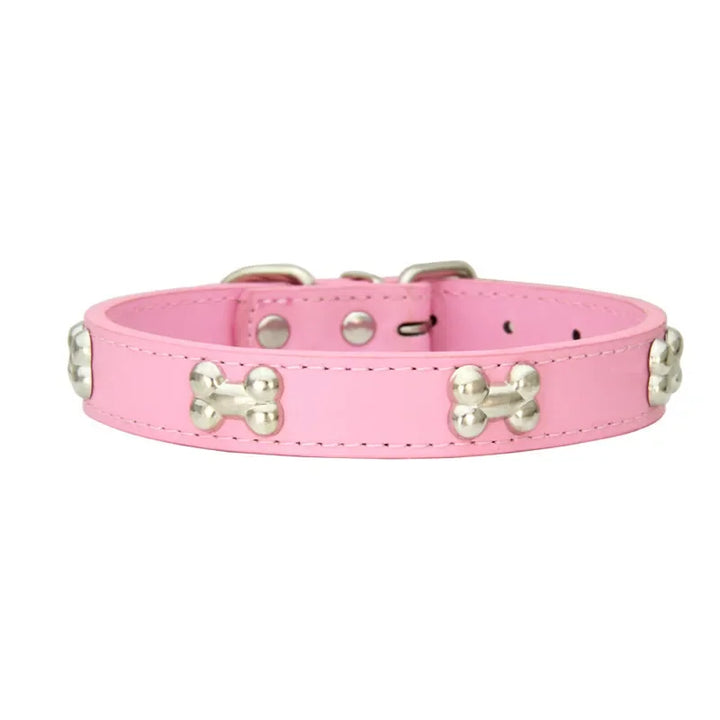 Pets-Shop. A pink dog collar with silver bone-shaped studs on a white background. Shopets-Amazon.