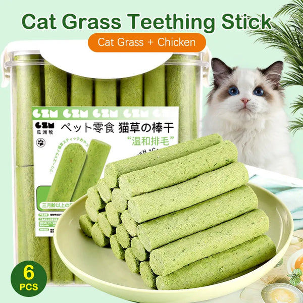 Pets-Shop Cat grass teething sticks with chicken flavor and a curious kitten in the background. Shopets-Amazon.