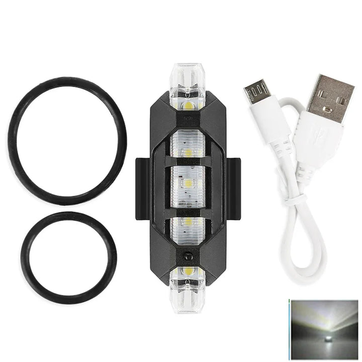 Pets-Shop. USB rechargeable LED bike light with two rubber mounting rings and a charging cable. Shopets-Amazon.