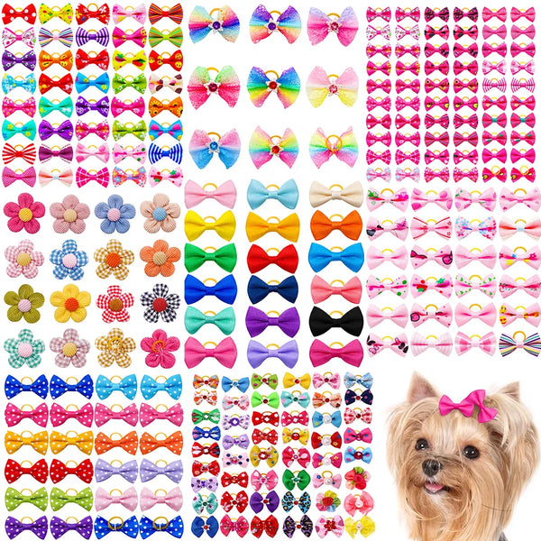 Pets-Shop. Assorted colorful pet bow ties and flower accessories displayed in rows above a cute Yorkshire Terrier wearing a pink bow. Shopets-Amazon.